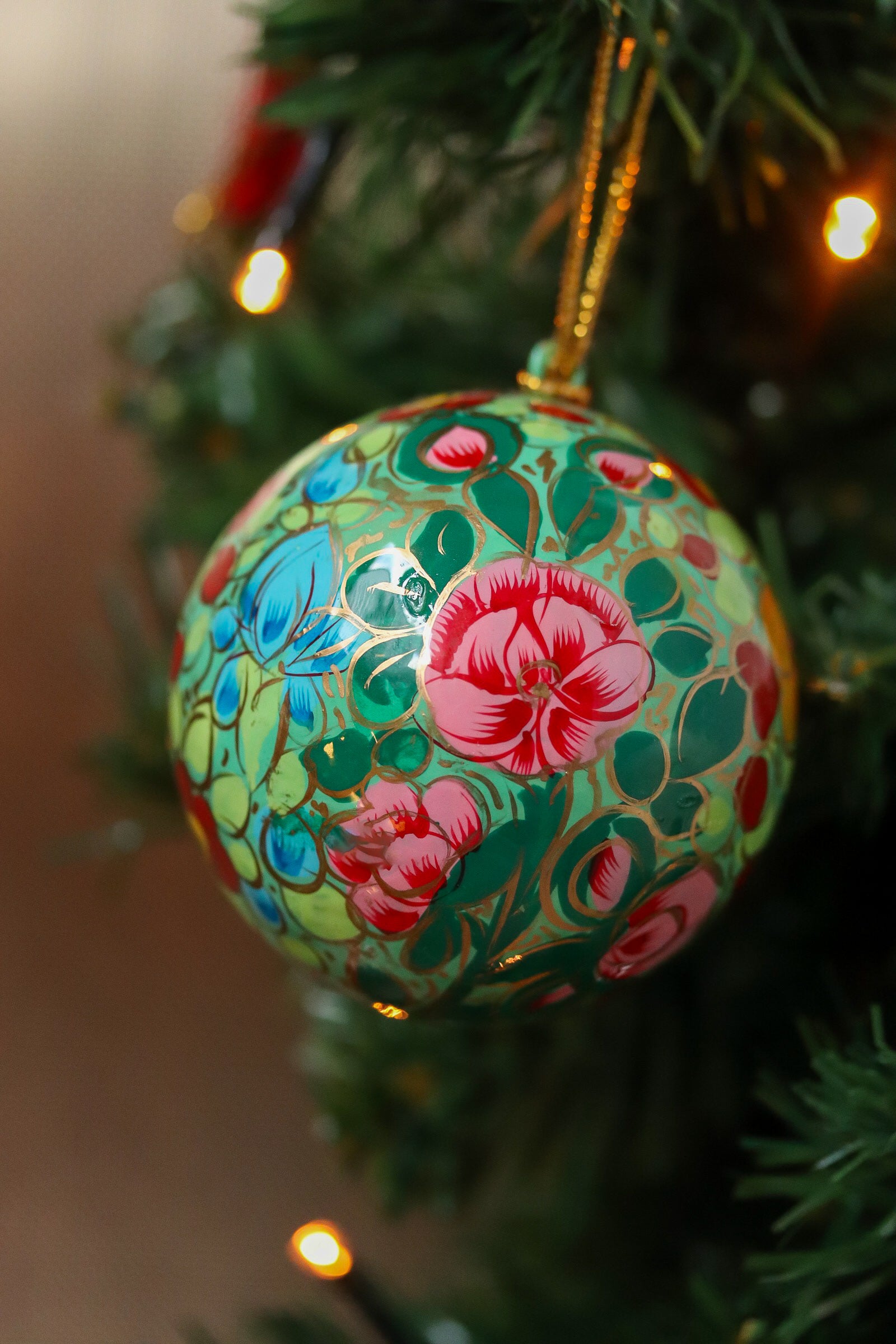 Kerstbal papier-maché (groen bloem)